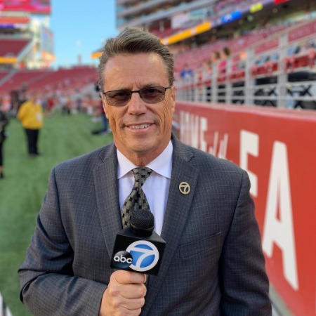 Curt Sandoval is posing for the photo.